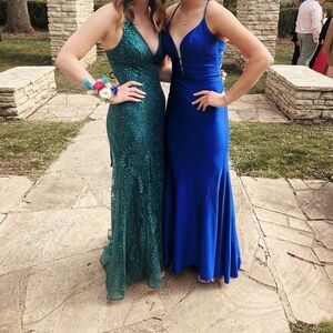 Green sparkly prom dress size 9. It has an adjustable back so it may fit up.